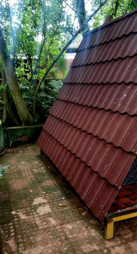 a brown roof on top of a patio at Bhatye Beach Resort MTDC in Ratnagiri