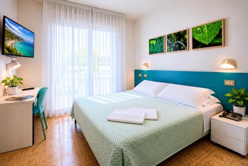 Llit o llits en una habitació de Eco-Hotel Edy