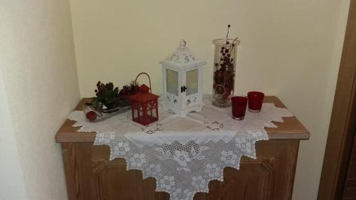 a table with a white table cloth on it at Hotel Garni Erler in Mayrhofen