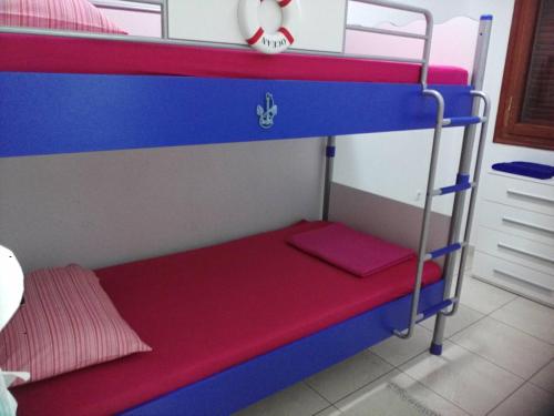 Palanda nebo palandy na pokoji v ubytování Janis Home