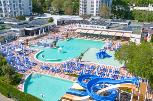 an overhead view of a swimming pool with a water park at Mera Resort in Venus