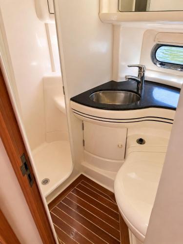 a bathroom with a sink in an rv at Midnight business in Thorpe