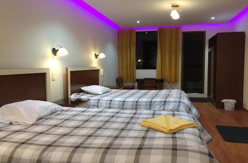 Una cama o camas en una habitación de Casa Suite