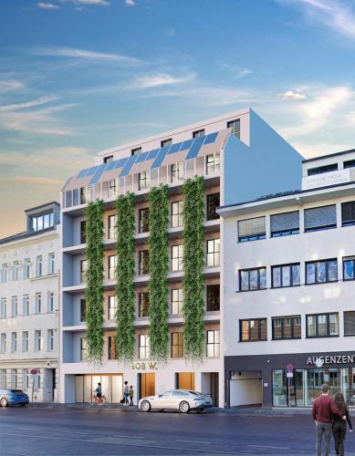 a building with a plant on the side of it at Bob W Vienna Döbling in Vienna