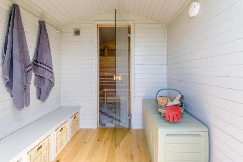 a small room with a bench and a door at 1 Bed in Knighton oc-51898 in Beguildy