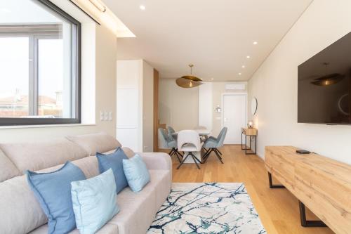 Coastal 3BR Duplex w Terrace by LovelyStay