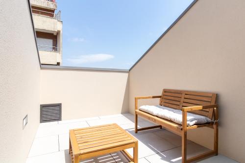 Coastal 3BR Duplex w Terrace by LovelyStay
