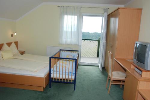 Postel nebo postele na pokoji v ubytování Gästehaus Gröblacher