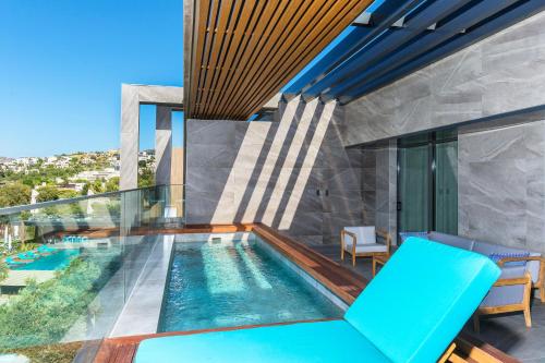 a swimming pool in a house at Arts Hotel Bodrum Yalikavak in Yalıkavak