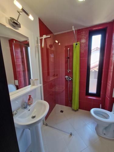 a bathroom with a sink and a toilet and a shower at INFINITY VIEW 8 Lozenets in Lozenets