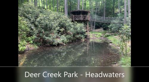 a sign that says deer creek park hazelleys at Headwaters Hideaway in Elk Park