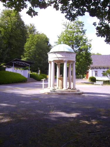 a white gazebo in the middle of a road at Ferienwohnung Fröhlich in Bad Suderode