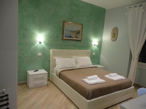 Katil atau katil-katil dalam bilik di Guest House Le Tre Spezie