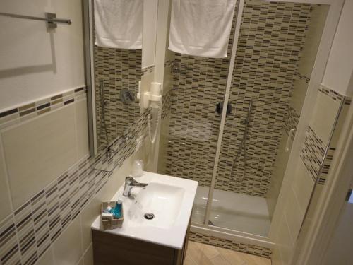 Bilik mandi di Guest House Le Tre Spezie