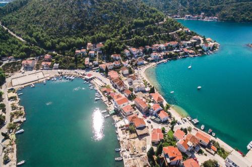 an aerial view of a town on a lake at Margaritum Blace - Seaview Apartment with Balcony in Blace