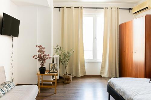 Foto Cozy Studio in City Center with Self Check-in