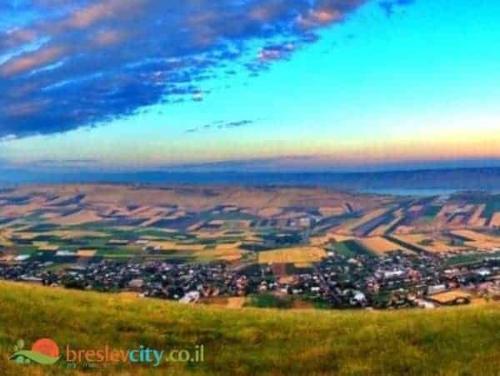 a view of a city from the top of a hill at שובל shoval in Yavneʼel