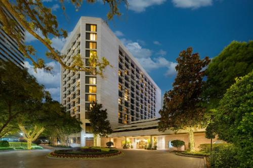 a rendering of a tall building at Houston Grand Hotel - River Oaks in Houston