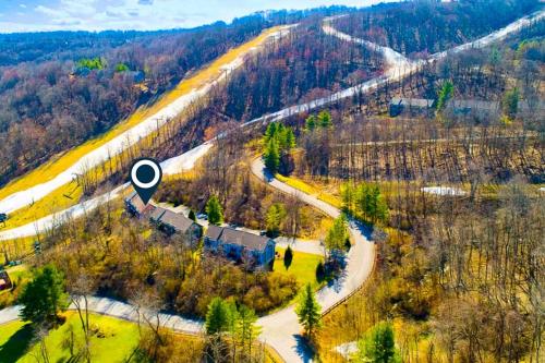 an aerial view of a road in a forest at Liftside Retreat in McHenry