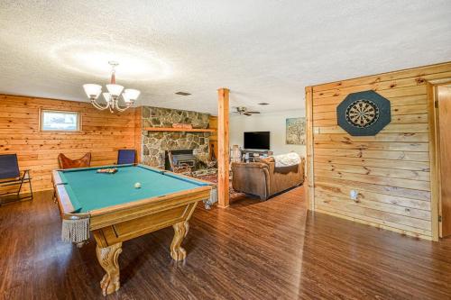 a living room with a pool table in it at Gleanings Pond in McHenry