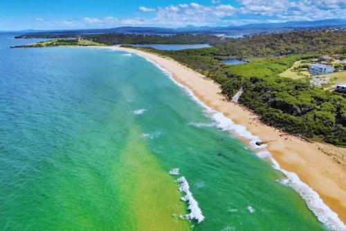 an aerial view of a beach in australia at Coastal Escape in Tura Beach