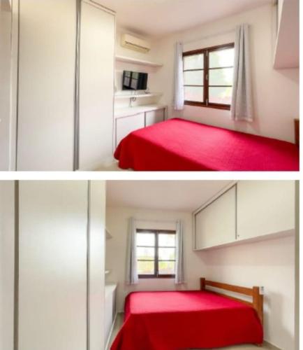 a bedroom with a red bed and a window at Flat 705 Winterville - Gravatá in Gravatá