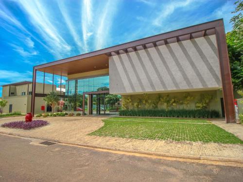 a rendering of a building with a red fire hydrant at ibis Styles Bonito in Bonito