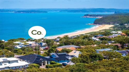 an image of a beach with a go sign at 'Gone Coastal' by HolidayCo in Killcare