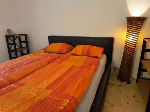 two beds sitting next to each other in a bedroom at Ferienwohnung Naturglück in Sellrain
