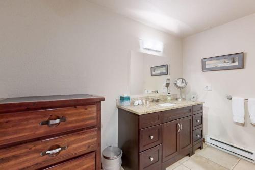 a bathroom with a sink and a mirror at Eagles Nest in Vail