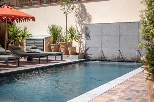 Swimmingpoolen hos eller tæt på Hotel Palacio de los Ángeles a member of LHW