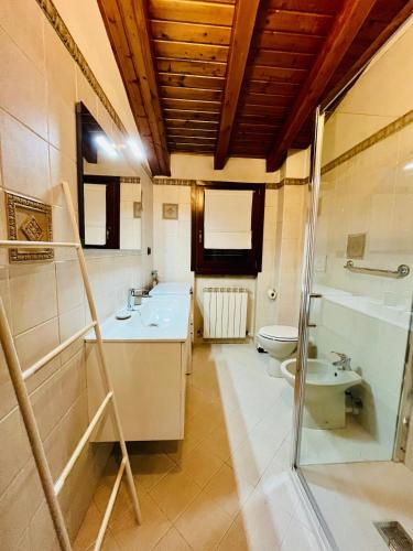 a bathroom with a sink and a toilet at BEddy & Breakfast - Station Loft in Seregno