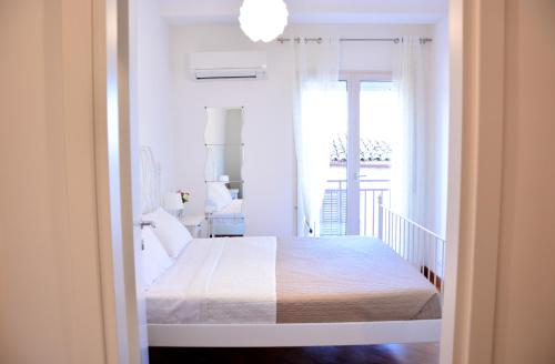 Postel nebo postele na pokoji v ubytování Sui tetti b&b
