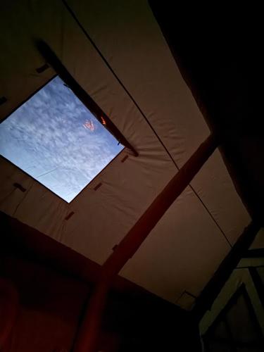 a window in the ceiling of a tent at Bosnian Nature Glamping in SJJ