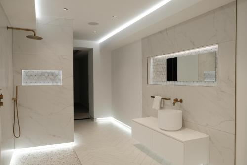 a white bathroom with a toilet and a shower at The Walled Garden House Rooms Only Not Entire House in Mundford