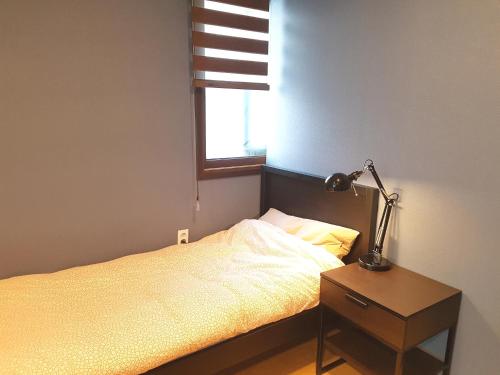 Katil atau katil-katil dalam bilik di Forêt Guest House Gangnam