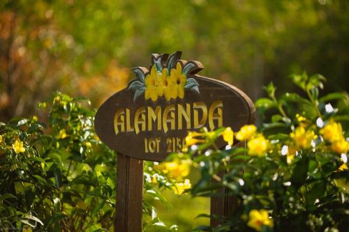 a sign that says alamanda hot air at Romantic Tropical Retreat with Sunset & Rice Field Views in Kuah