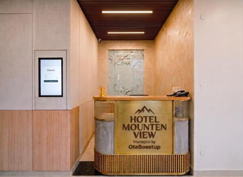 a room with a hotel mountain view sign on a wall at Hotel Mounten View Near PEC & PGI in Chandīgarh