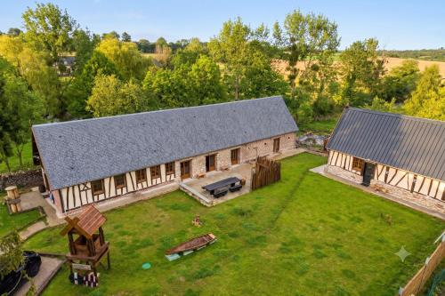an aerial view of a barn with a roof at Iaks keramik in Saumont-la-Poterie