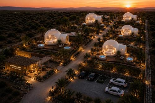 an aerial view of a desert motel at sunset at Buba Glamp - Hotel Burbuja in Blascoeles