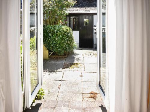an open door of a house with a hallway at Rivers View - Uk49662 in Braunton