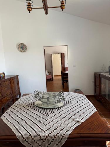a room with a table with a bowl on it at Casa Grande do Monte in Mértola