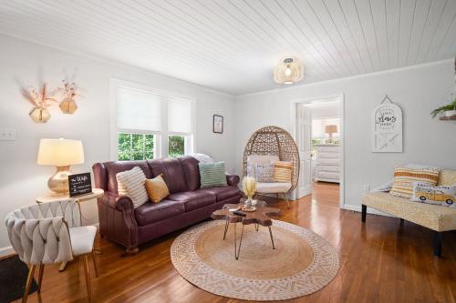 a living room with a couch and a table at Little Elves Overlook in Sparta