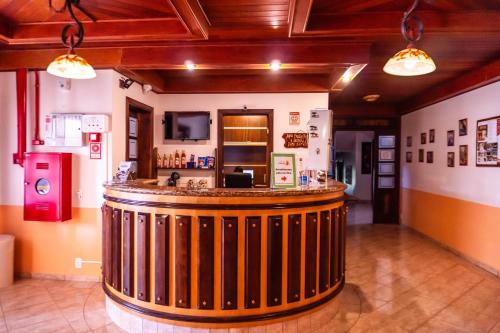 a bar in the middle of a room at Pousada Vollweiter in Entre Rios