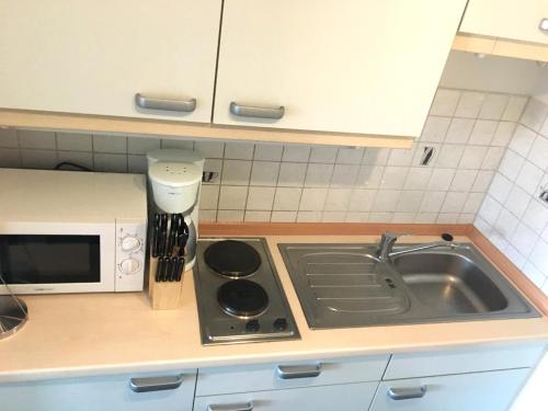 Η κουζίνα ή μικρή κουζίνα στο Business Appartement