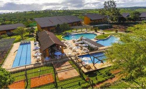 an aerial view of a resort with two swimming pools at Flat 705 Winterville - Gravatá in Gravatá