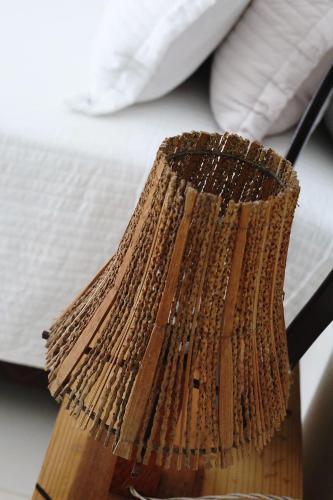 a bunch of wooden sticks sitting on a table at Suite Areal in Atins