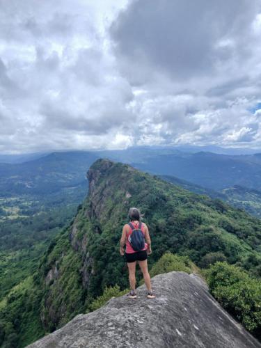 a person standing on top of a mountain at The Off Road Homestay in Kandy
