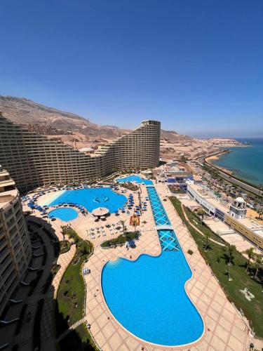 an aerial view of the pool at a resort at Porto sokhna pyramids in Ain Sokhna
