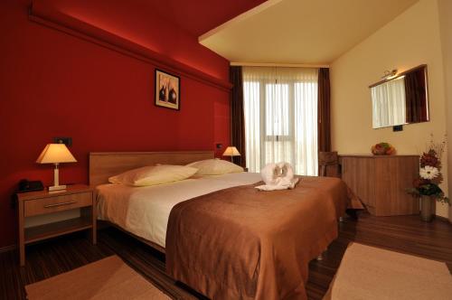 Postel nebo postele na pokoji v ubytování Hotel Fontana